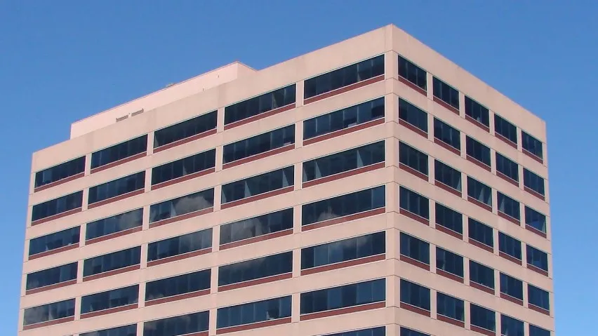 The pink office tower at 501 South Cherry Street in Denver, where SBA CPA has its Denver office