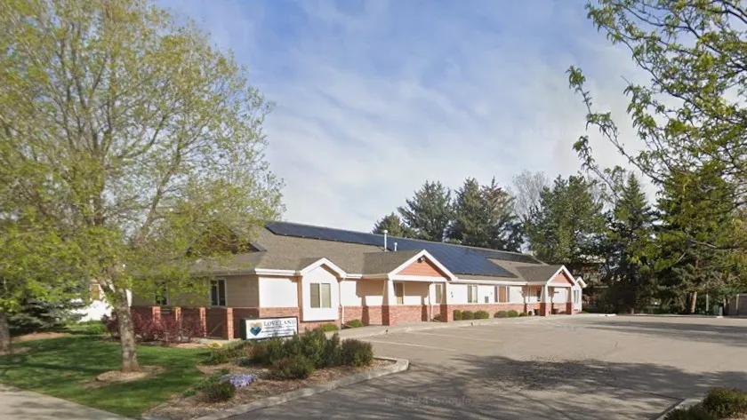 The single-story office building on East 27th Street in Loveland, with solar panels on the roof, where SBA CPA and Loveland CPAs are located
